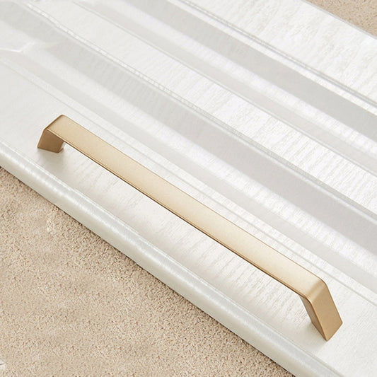 Gold cabinet drawer handle with rectangular bar and angled end supports