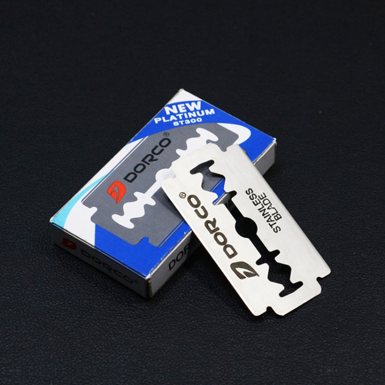 Stainless steel double-sided shaving blades; one blade exposed from box