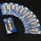 Multiple stainless steel double-sided shaving blade boxes arranged in a row