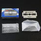 Stainless steel shaving blade in paper sleeve with box and blade card
