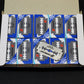 Ten stainless steel double-sided shaving blade boxes in an open carton