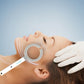 Handheld vascular imaging device scanning ring held to a face