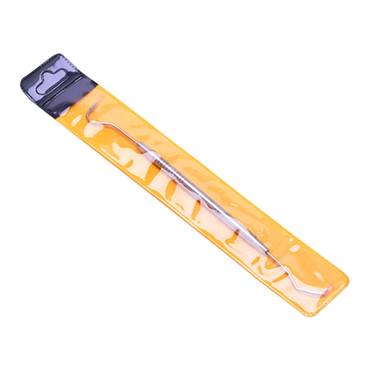 Blister pack containing a stainless steel dental tool in orange and clear plastic