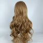 Back view of long blonde wavy curly wig with full volume