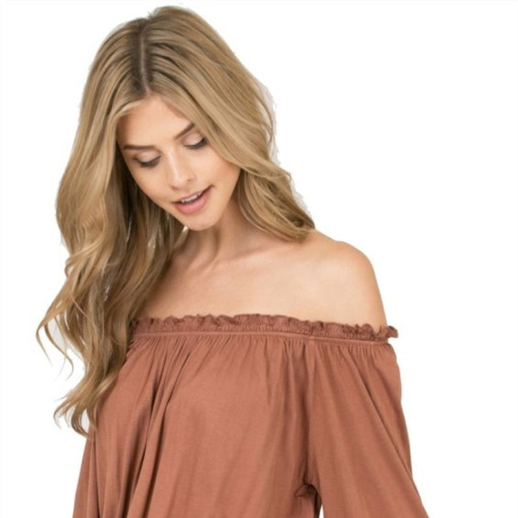 Long blonde wavy curly wig with soft fringe and face-framing layers