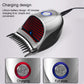 Electric hair clipper on charging with black cord and red cutter grille