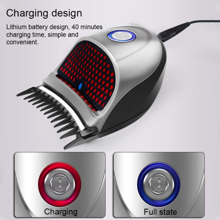 Electric hair clipper on charging with black cord and red cutter grille