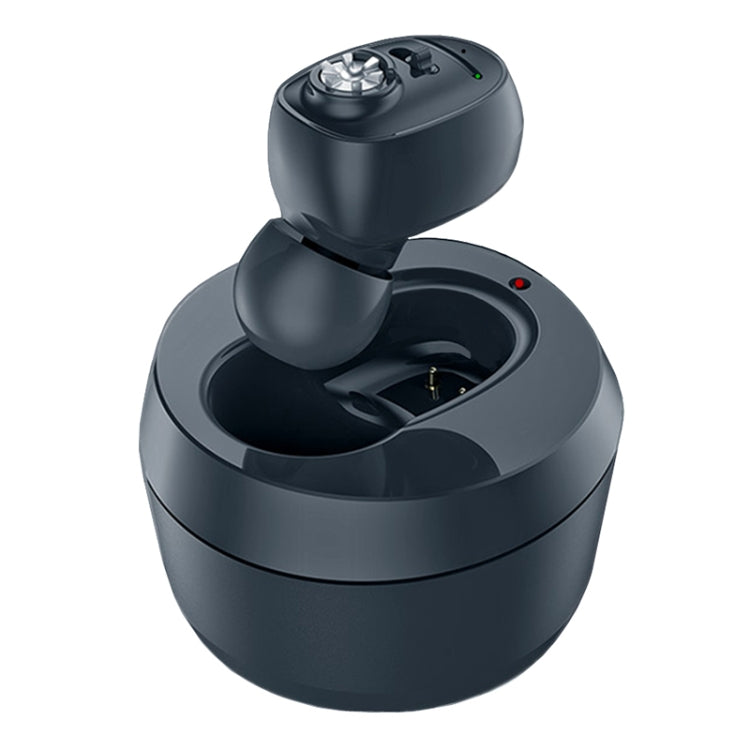 In-ear Bluetooth hearing aid with open charging case and black earbud