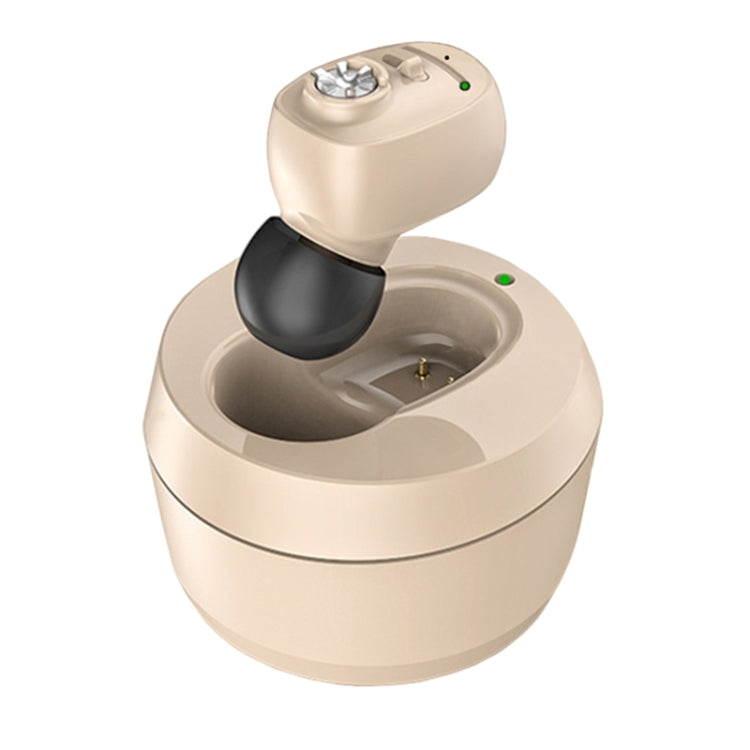 In-ear Bluetooth hearing aid with open charging case and flesh-colored earbud