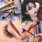 Waterproof 4D eyelash mascara wand applying a black coat to lashes