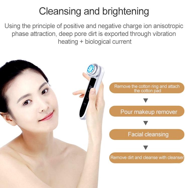 Silver handheld facial massager with blue LED head held near face
