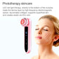 Pink facial massager with red LED treatment head shown beside face