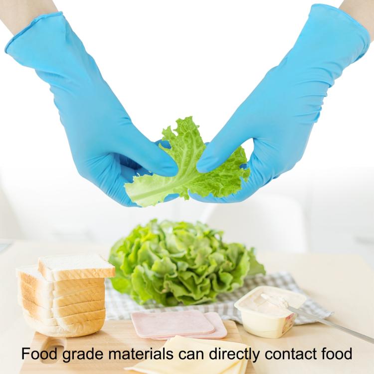 Blue nitrile gloves holding leafy greens, protective disposable fit