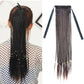 Gray-brown braided ponytail hair extension with two fabric straps and multicolor thread accents