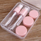 Travel size cosmetics bottle kit with three pink squeeze caps and clear squeeze tubes