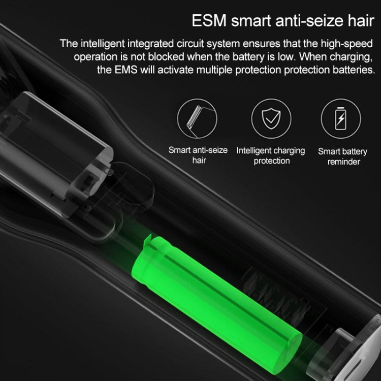 White electric hair trimmer with internal battery module indicator