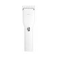 White electric hair trimmer with comb guide and metal cutting blades