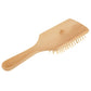 Large wooden massage hair comb with rounded handle and pin-side view