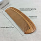 Brown wooden comb with carved floral design and fine, evenly spaced teeth