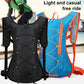 Hydration backpack in black, with chest strap and front pocket; blue version behind.