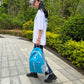 Foldable hiking backpack, light blue with open interior and top zipper
