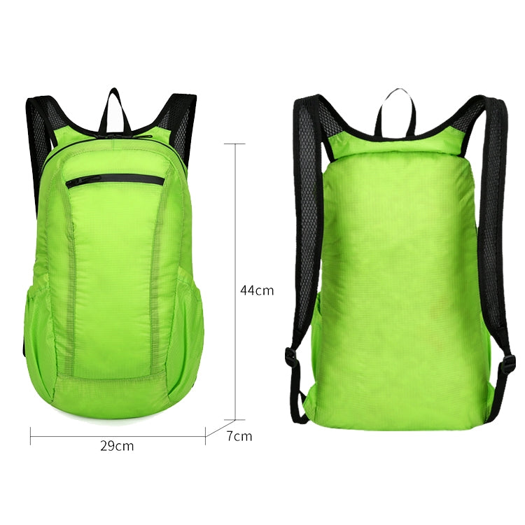 Bright green foldable backpack with black straps and front zip pocket, front and back view.