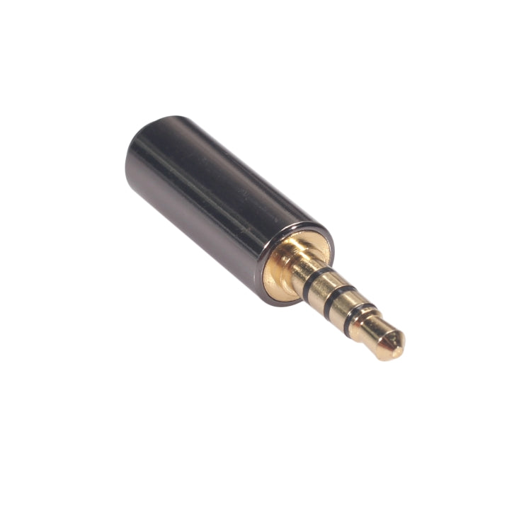 Universal 3.5mm audio plug adapter with gold contacts and dark metal body