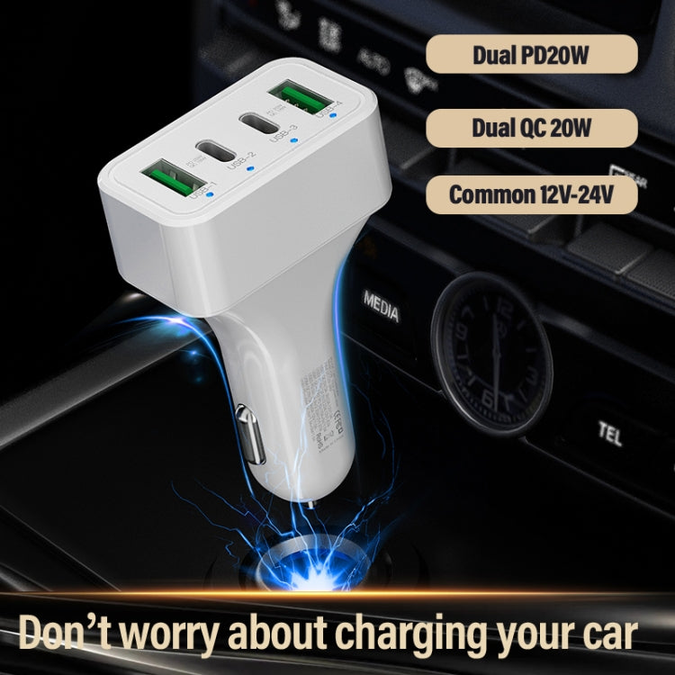 White dual-port car charger plugged in with two green USB ports