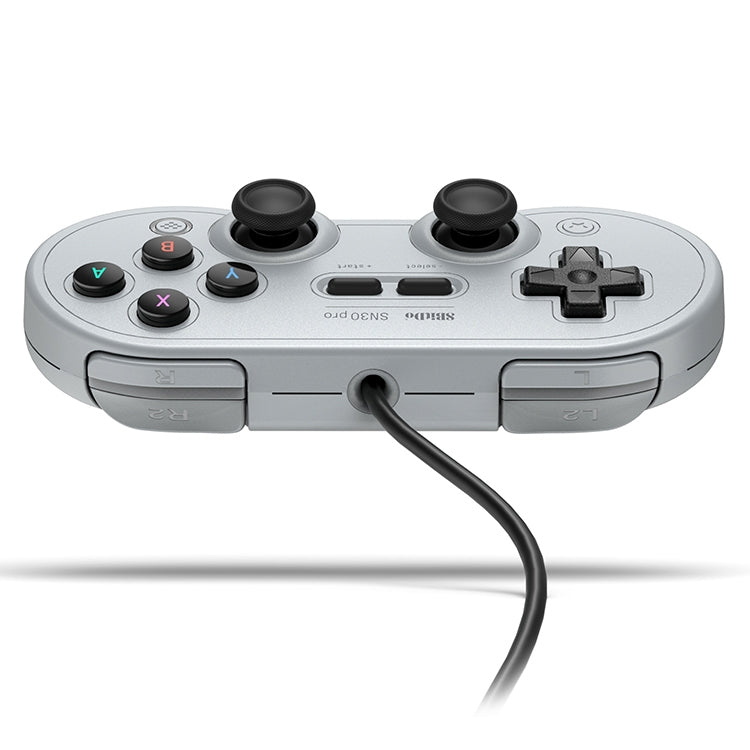Grey wired gamepad rear view with triggers, D-pad, and two thumbsticks