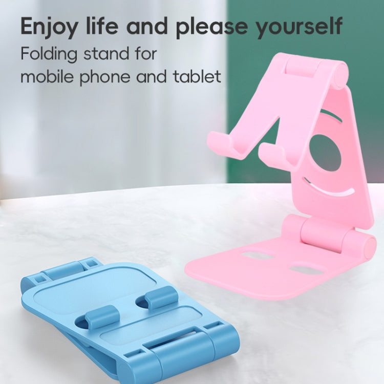 Foldable pink phone stand with two cutout positions and stable flat base