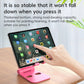 Foldable phone stand, pink, holding a tablet on a tabletop