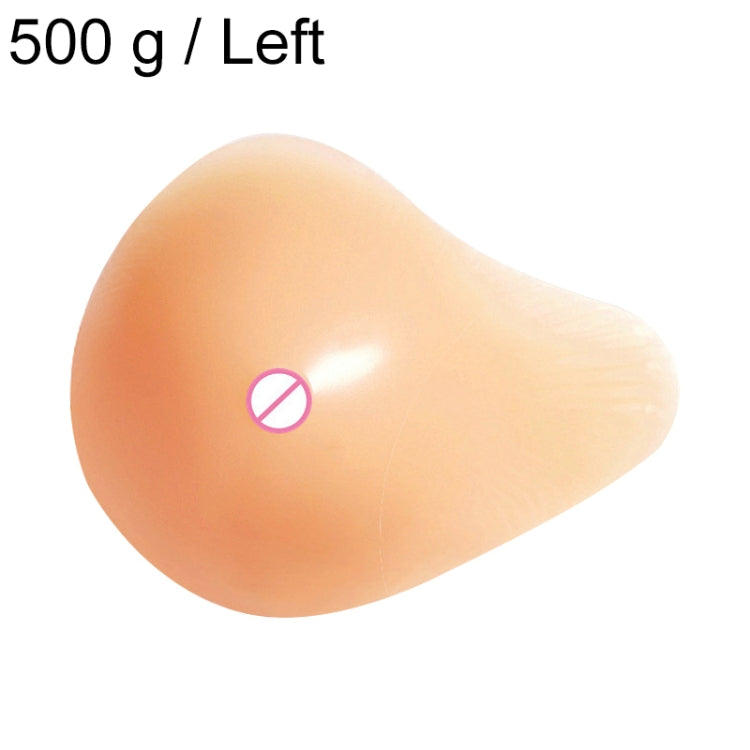Left silicone breast pad with spiral shape, smooth light peach surface.