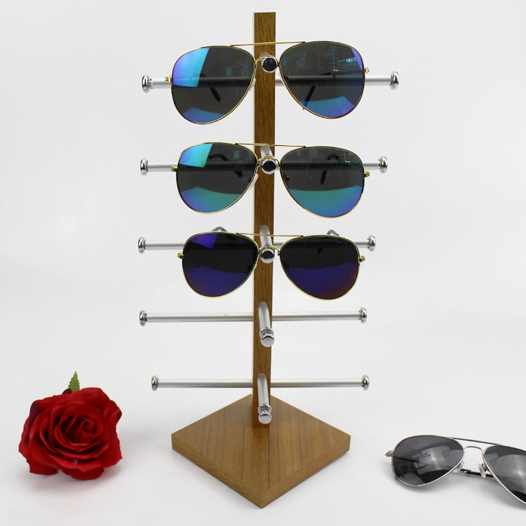 Grain wood sunglasses display stand with horizontal metal arms holding 6 pairs of shades