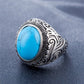 Men’s titanium steel ring with turquoise blue oval gemstone and ornate silver bezel
