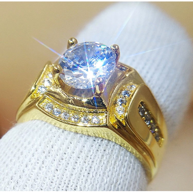 Gold-tone men’s ring with large clear round stone and pavé accents