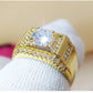 Gold-plated men’s ring close-up on center round stone with bright zircon halo