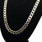 Gold curb-link chain necklace detail with interlocking oval links