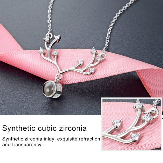 Silver tree-branch pendant necklace with round memory stone and sparkly cubic zirconia