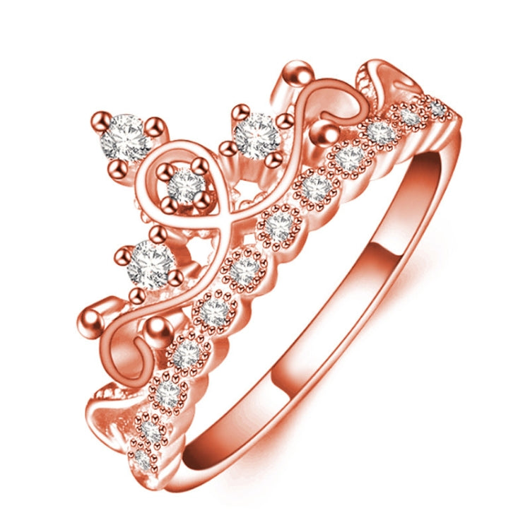 Rose gold crown-shaped zircon ring with heart-like details and sparkling clear stones