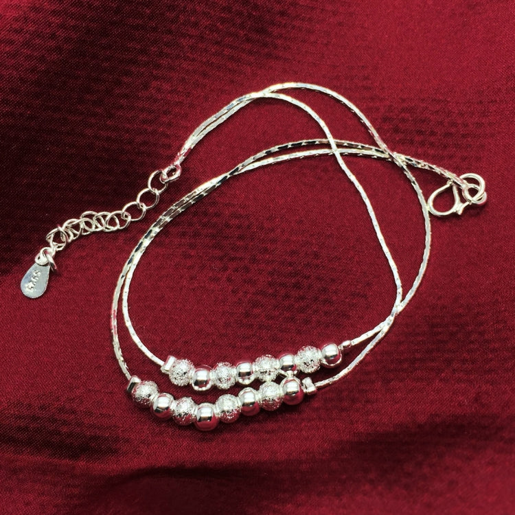 Silver-tone anklet with thin chain, frosted bead strand, and heart clasp