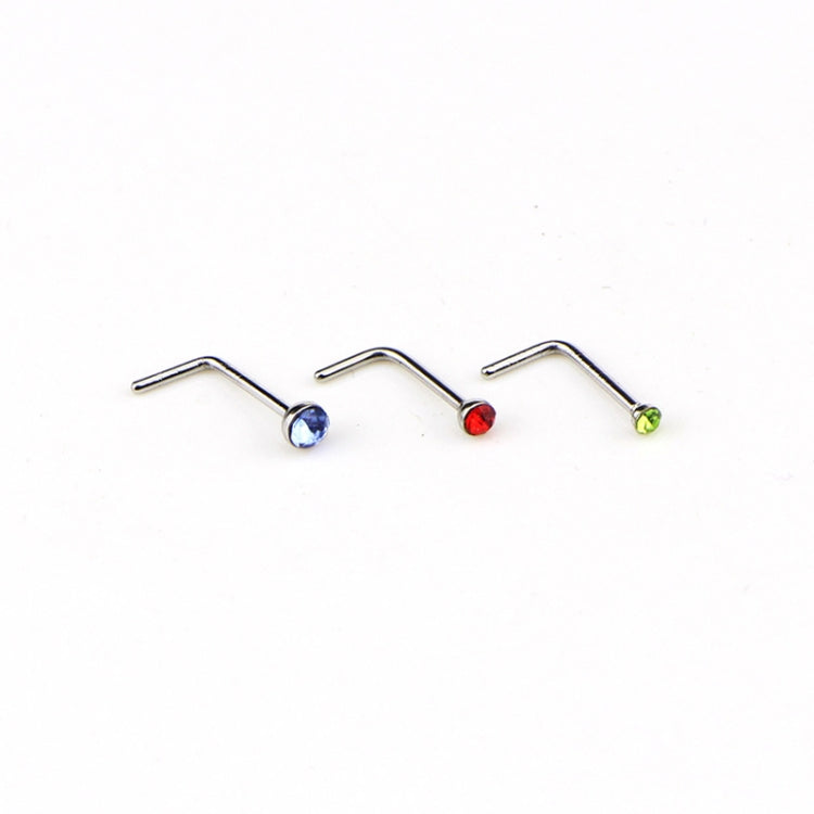 Three L-shaped nose studs with blue, red, and green crystal ends
