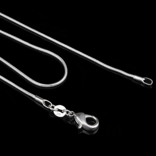 Silver snake bone chain necklace close-up with lobster clasp and spring ring