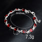 Silver bracelet with red oval stones, 8-inch length, 7.3g weight, inner size 5.7cm.