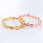 Gold and rose gold twist rhinestone rings, linked openwork design