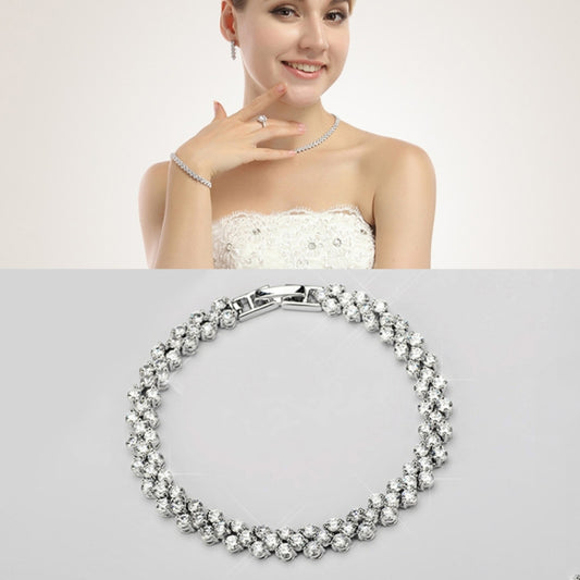 Platinum-tone zircon tennis bracelet with clustered round stones and box clasp