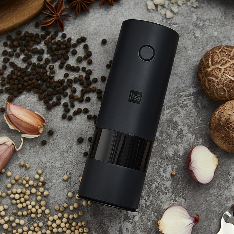 Electric pepper grinder, black with visible clear spice container and open top