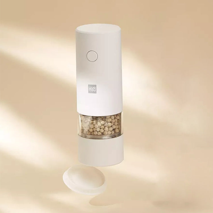Electric pepper grinder, white cylinder with button and clear spice chamber