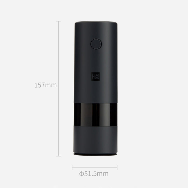 Black electric pepper grinder with round button and compact cylindrical body