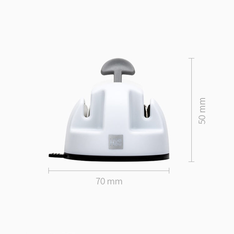 White compact double-wheel knife sharpener, side profile with size markings