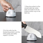White double-wheel knife sharpener with suction base in use on a table